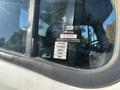 A label on the window of a 2005 Freightliner M2 106 showing a certificate of approval with months listed from January to May and the serial number GN 45225
