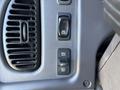 Control panel of a 2005 Freightliner M2 106 featuring buttons for speed control and cruise settings